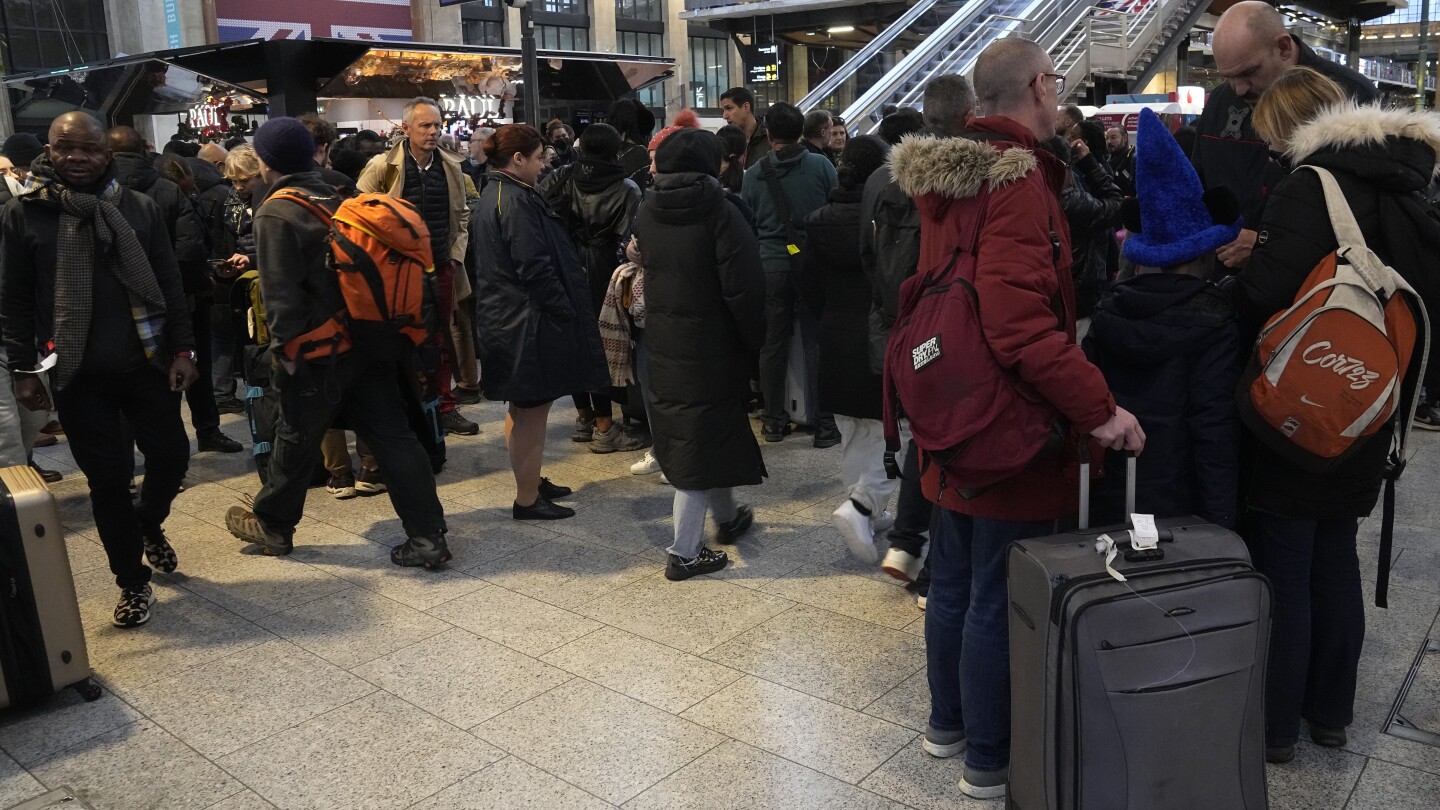 A wildcat strike shuts down English Channel rail services, causing misery for Christmas travelers | AP News