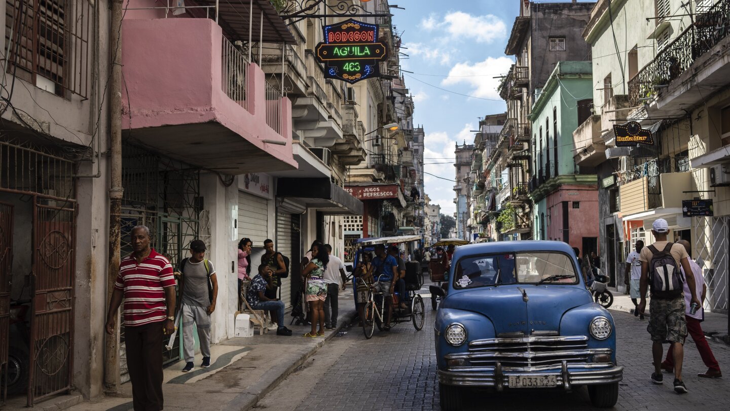 Cuban government defends plans to either cut rations or increase prices | AP News