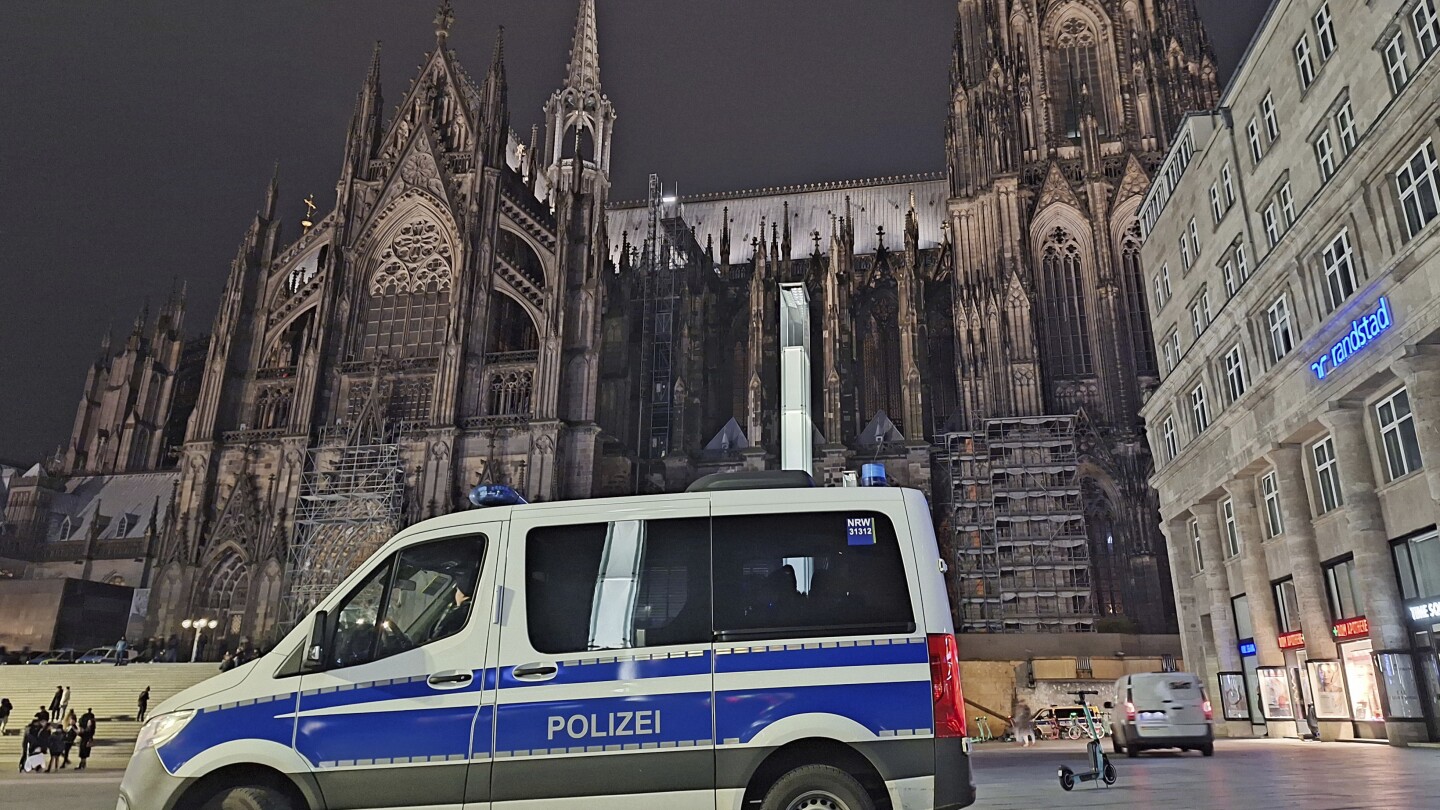 Christmas Eve worshippers to face security screening at Cologne cathedral as police cite attack risk | AP News