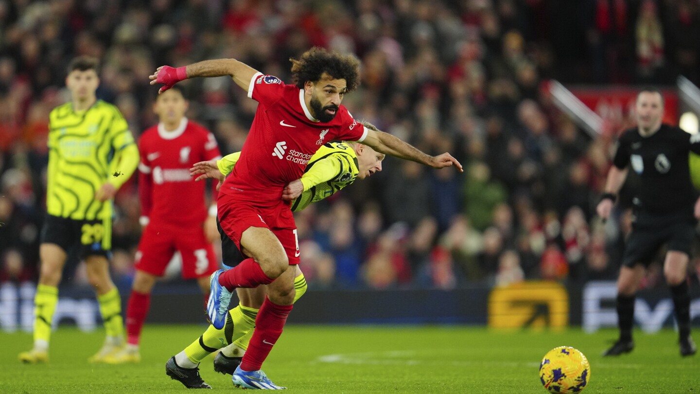 Liverpool star Mohamed Salah ‘shares pain’ of grieving families at Christmas amid Israel-Hamas war | AP News