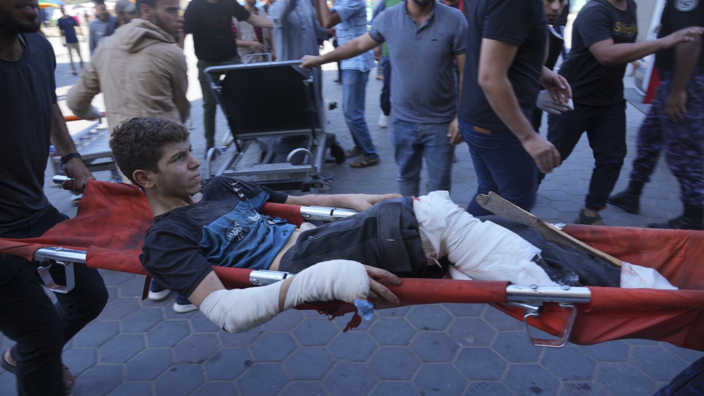 Lose a limb or risk death? Gaza’s war-wounded face hard decisions | AP News