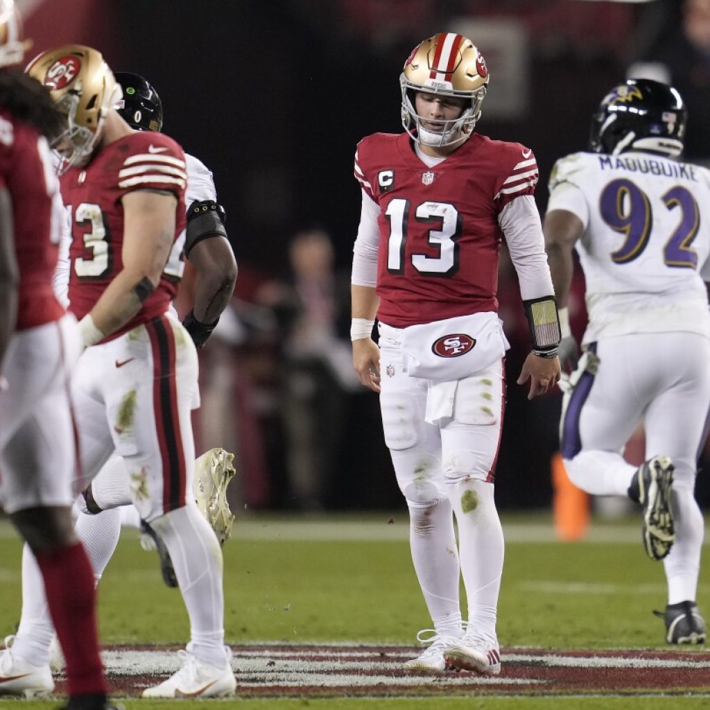 Brock Purdy’s 4 interceptions doom the 49ers in 33-19 loss to the Ravens | AP News