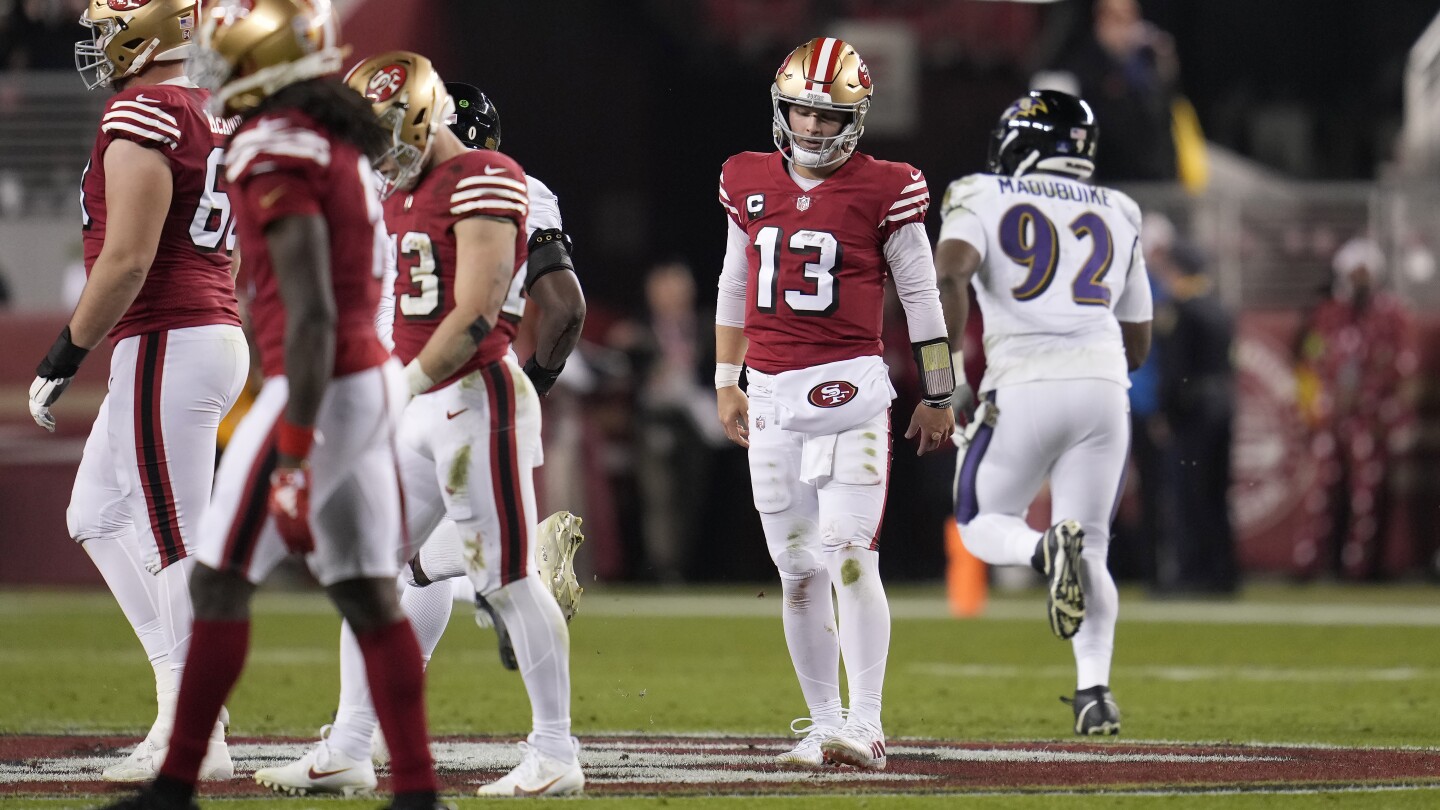 Brock Purdy’s 4 interceptions doom the 49ers in 33-19 loss to the Ravens | AP News