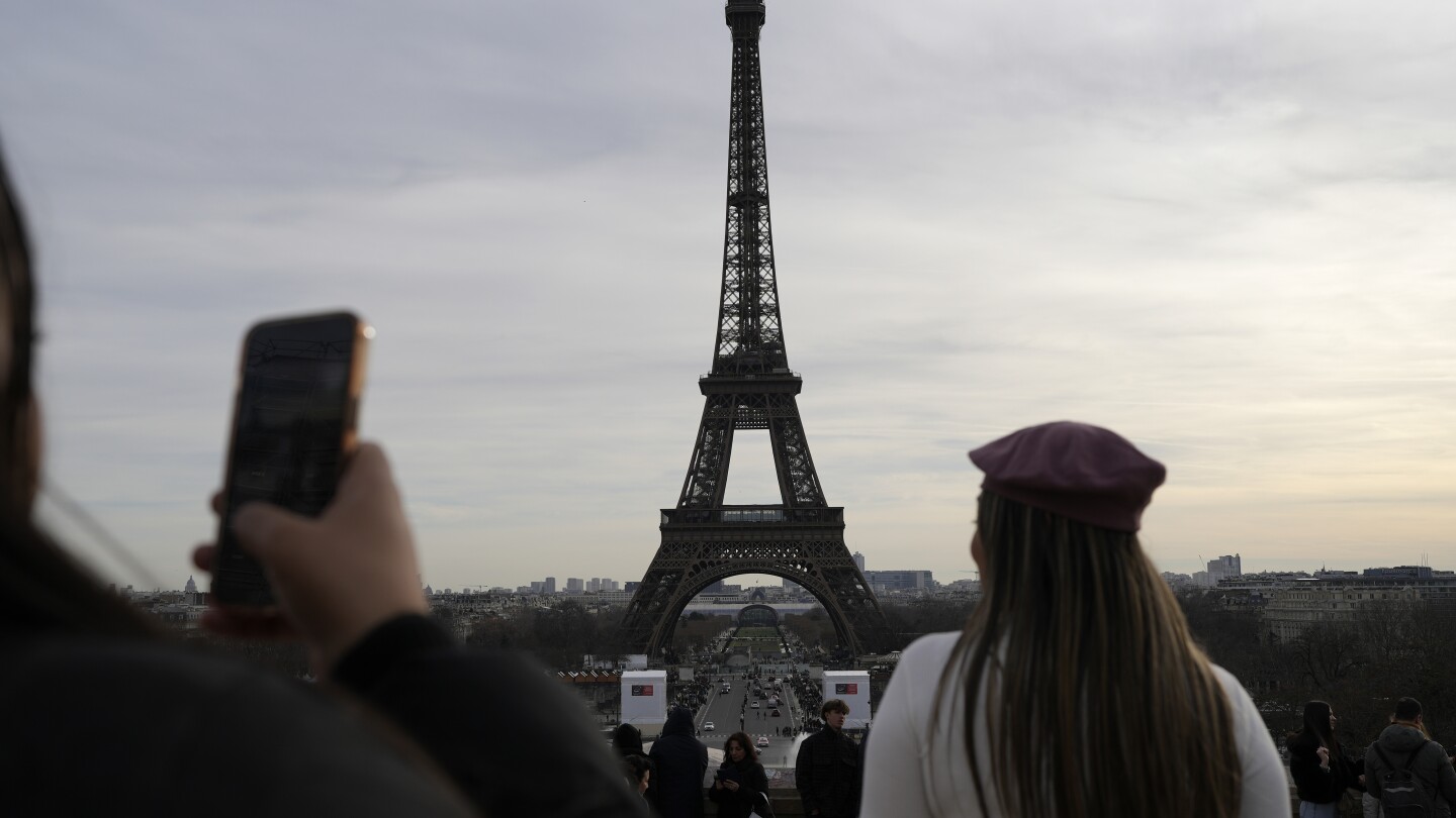 The Eiffel Tower is closed while workers strike on the 100th anniversary of its founder’s death | AP News