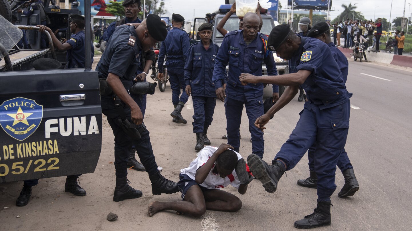 Opposition candidate in Congo alleges police fired bullets as protesters seek re-do of election | AP News