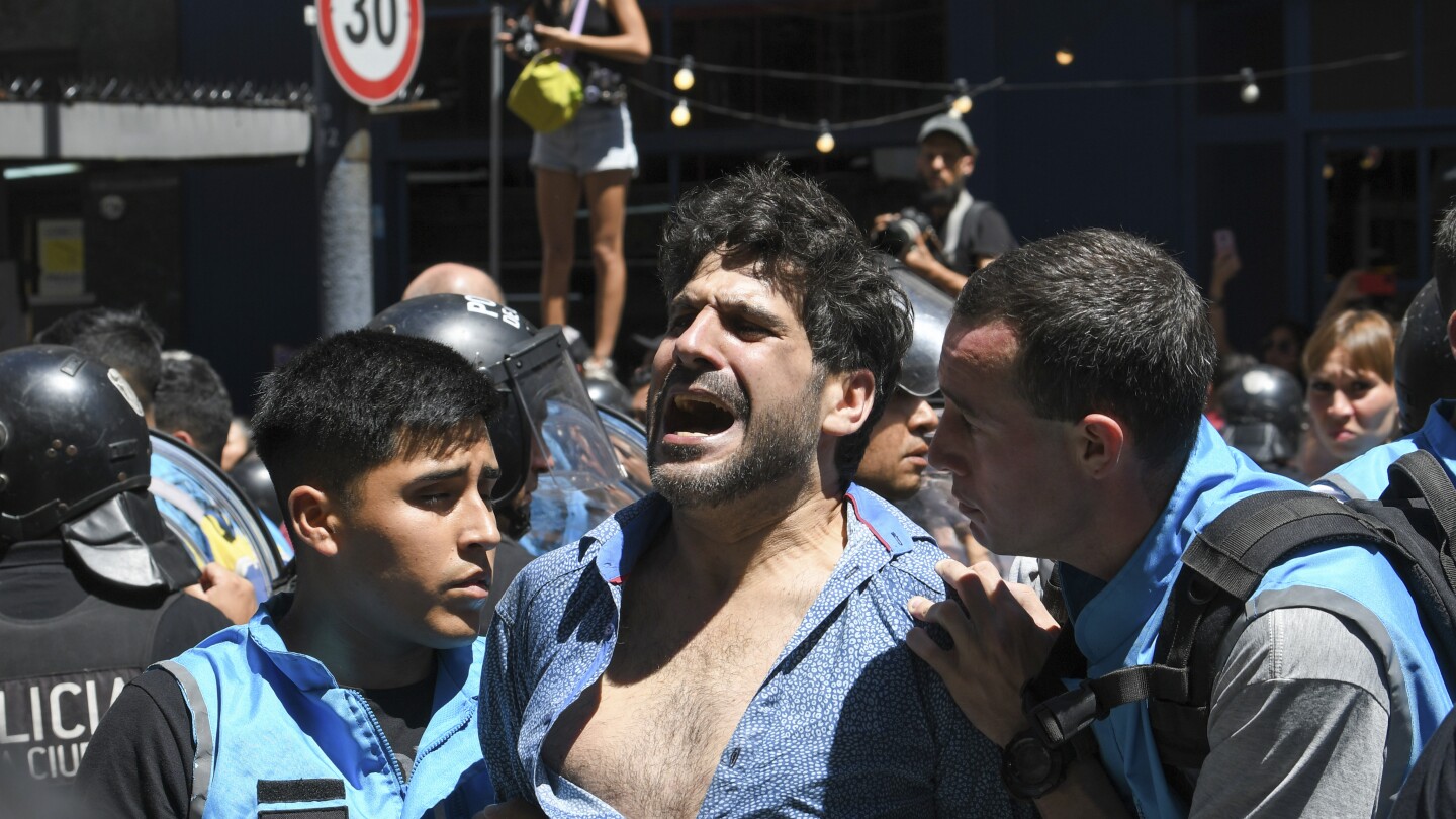 Argentina’s unions take to the streets to protest president’s cutbacks, deregulation and austerity | AP News