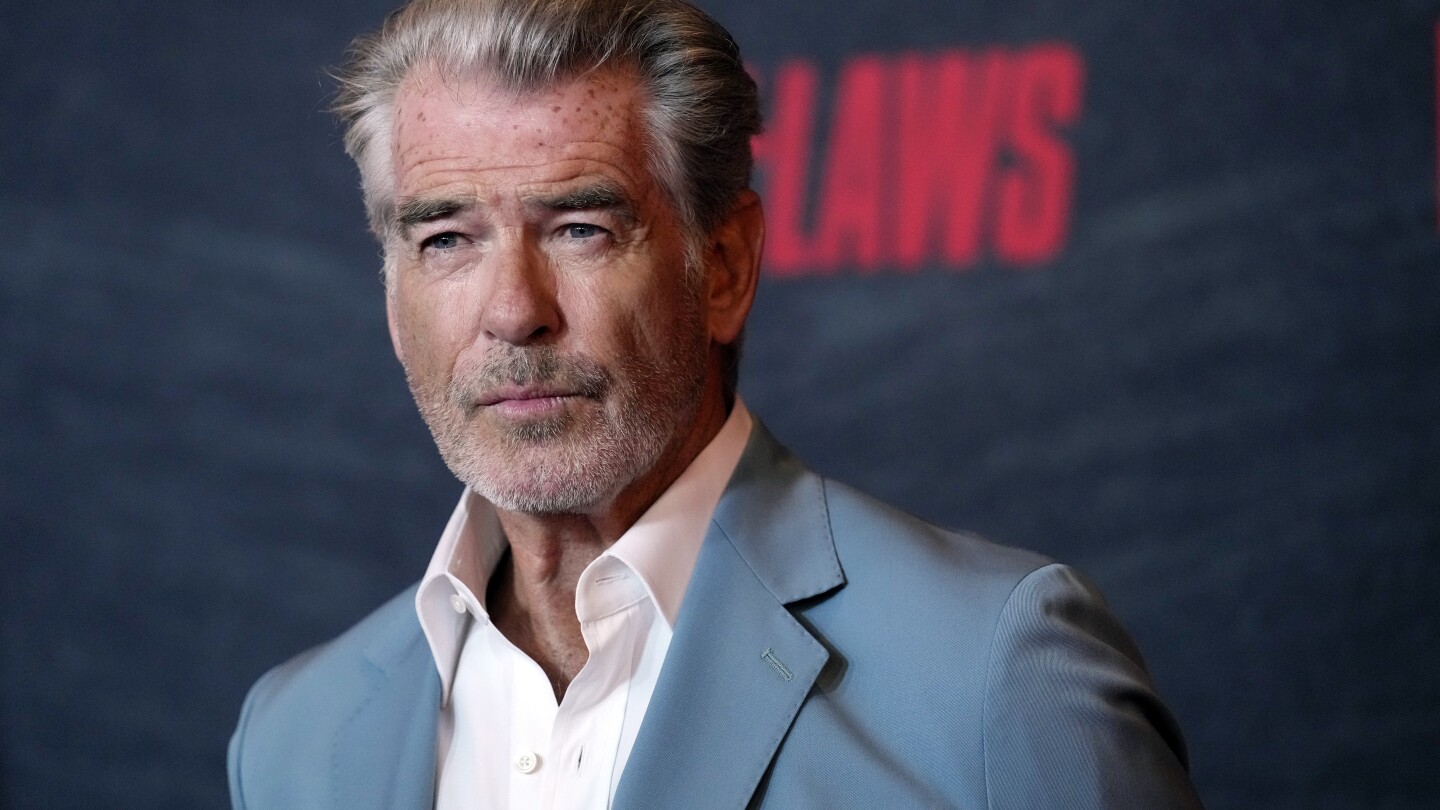 Pierce Brosnan accused of trespassing in Yellowstone National Park thermal area | AP News