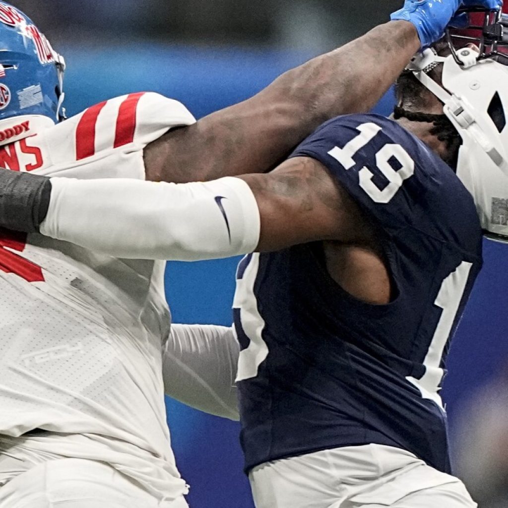 Penn State defense overwhelmed by Ole Miss tempo and ‘too many moving parts’ in Peach Bowl loss | AP News