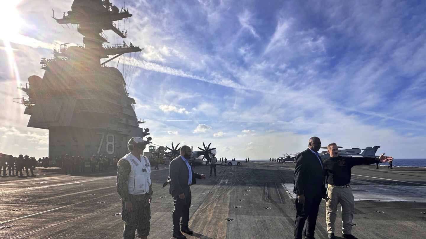 The USS Gerald R. Ford aircraft carrier returns home after deployment defending Israel | AP News