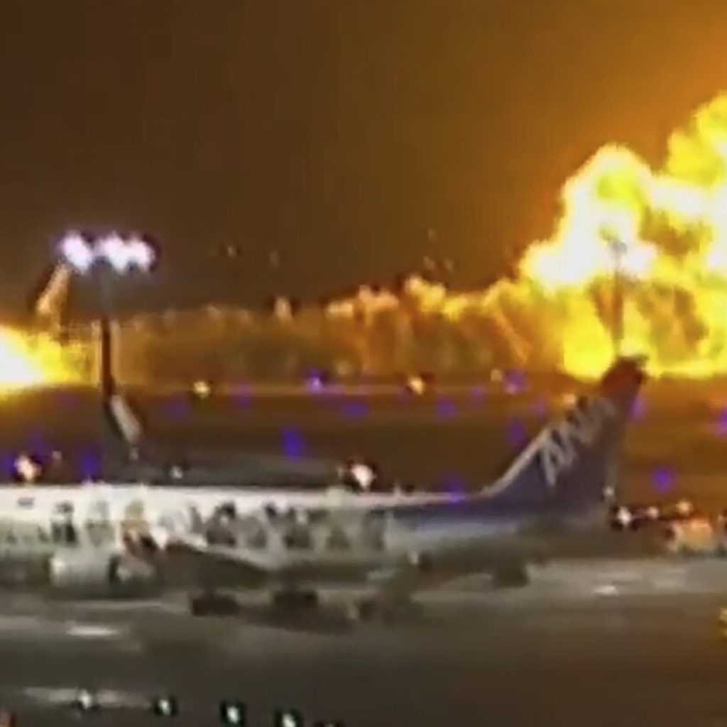 Plane catches fire on runway at Japan’s Haneda airport after collision, passengers reportedly safe | AP News