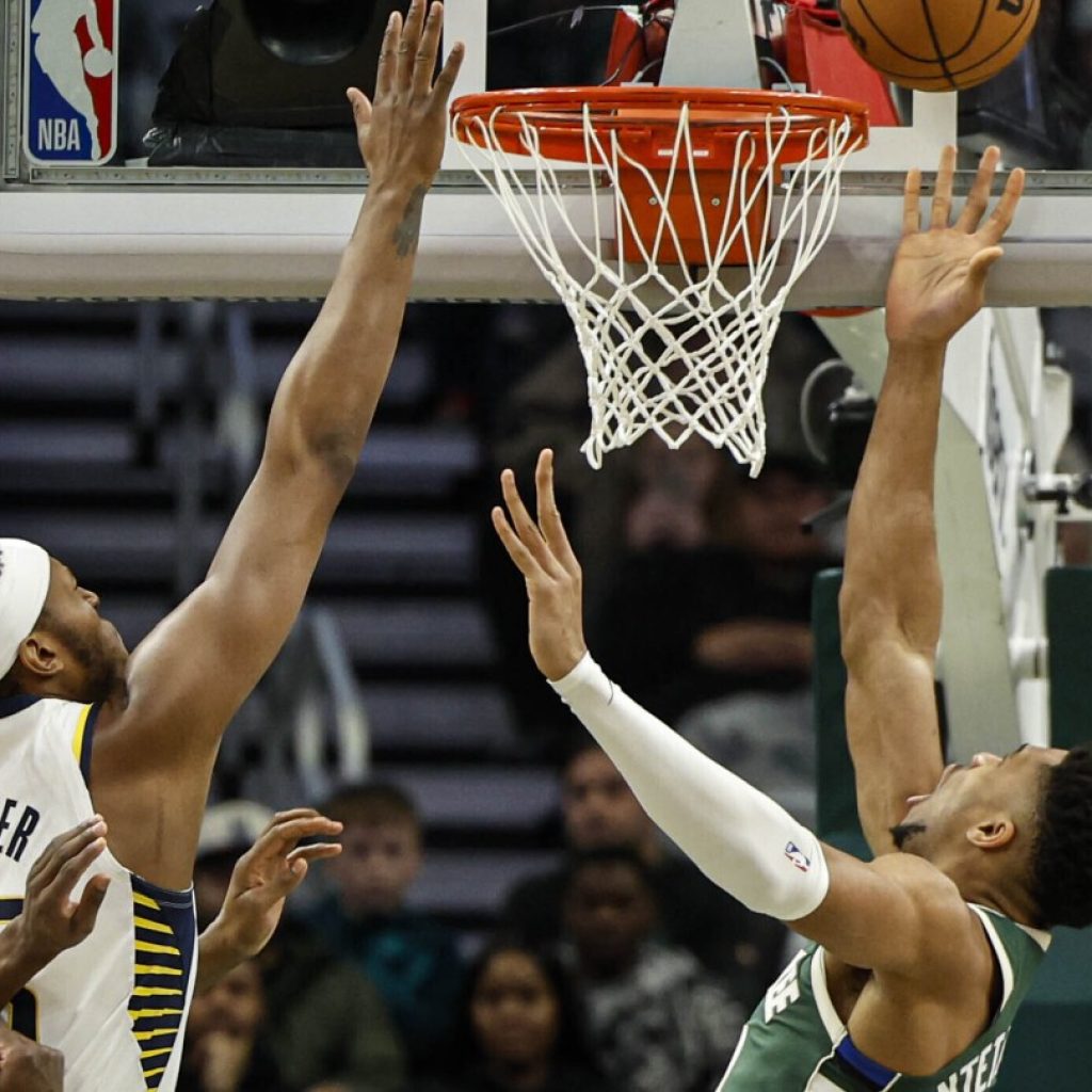 Haliburton gets help from Indiana’s reserves as Pacers win 122-113, end Bucks’ home win streak | AP News