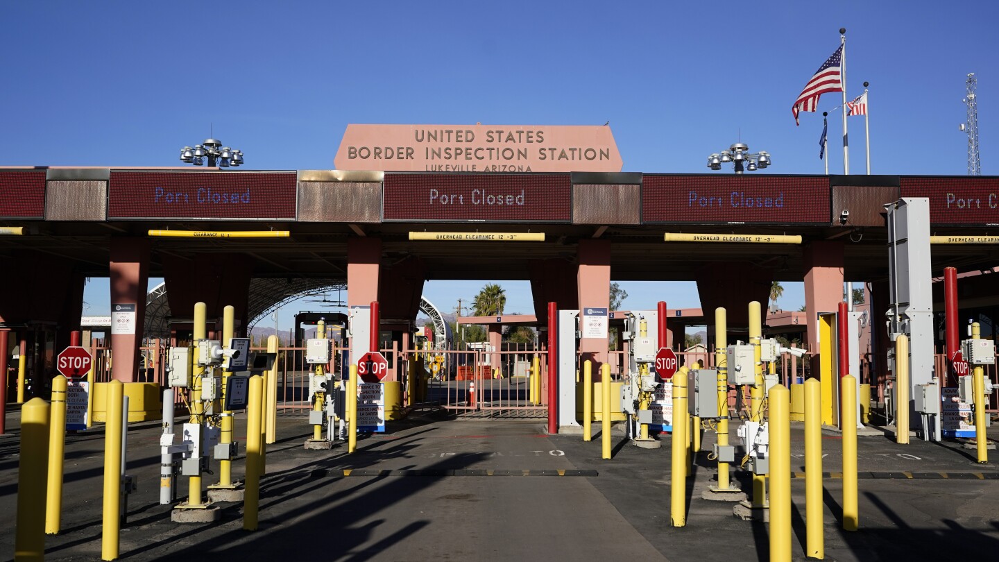 Arizona border crossing to reopen a month after migrant influx forced closure | AP News