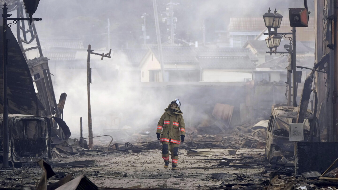 Japan earthquakes: Rescuers race against time as multiple dead. Follow the latest | AP News