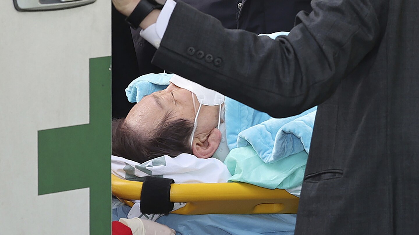 South Korea: Opposition leader in ICU after being stabbed in the neck | AP News