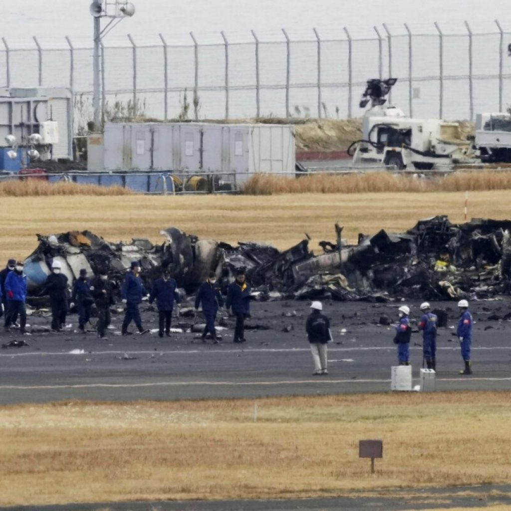 Japan plane crash: Police probe possible negligence | AP News