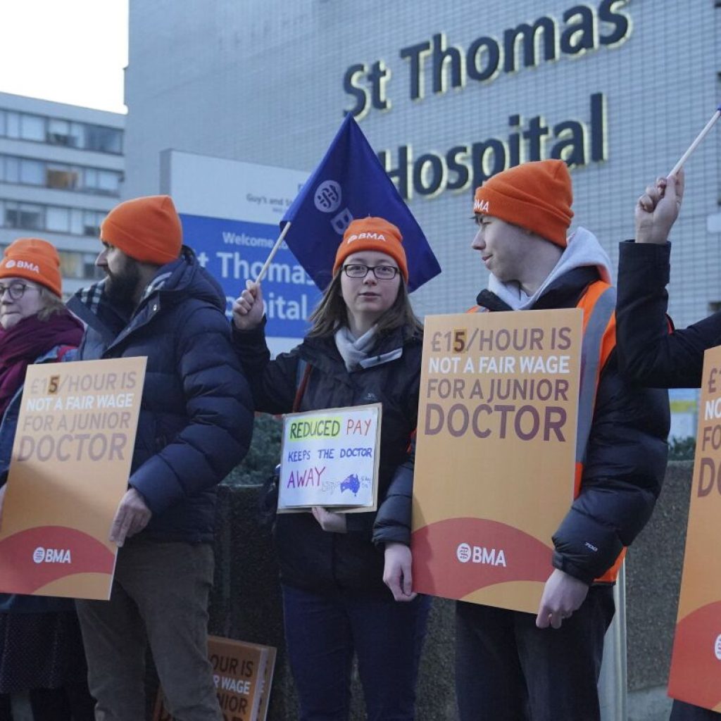 Thousands of doctors in Britain walk off the job in their longest-ever strike | AP News