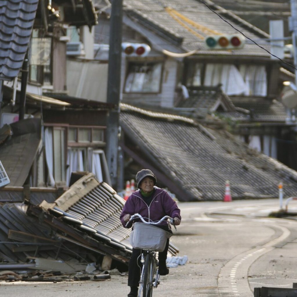 Search presses on for earthquake survivors as Japan grieves the lives lost | AP News