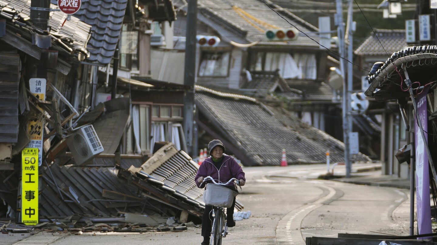 Search presses on for earthquake survivors as Japan grieves the lives lost | AP News