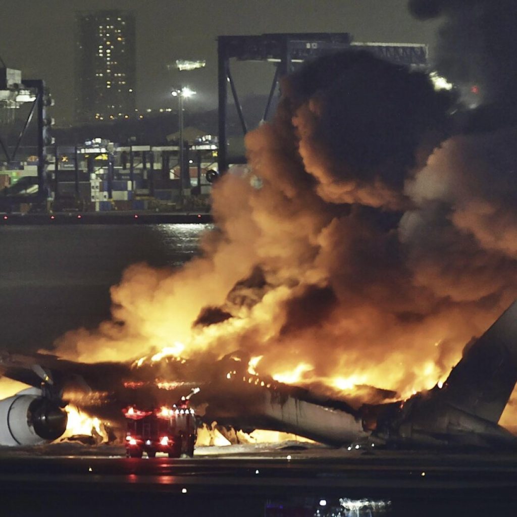 A jet’s carbon-composite fiber fuselage burned on a Tokyo runway. Is the material safe? | AP News