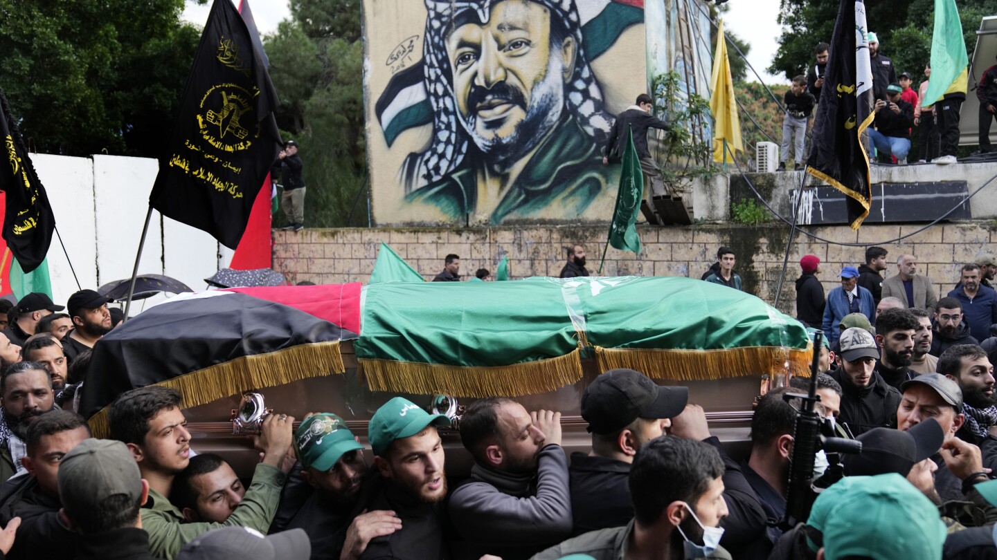 Thousands attend the funeral of a top Hamas official killed in an apparent Israeli strike in Beirut | AP News