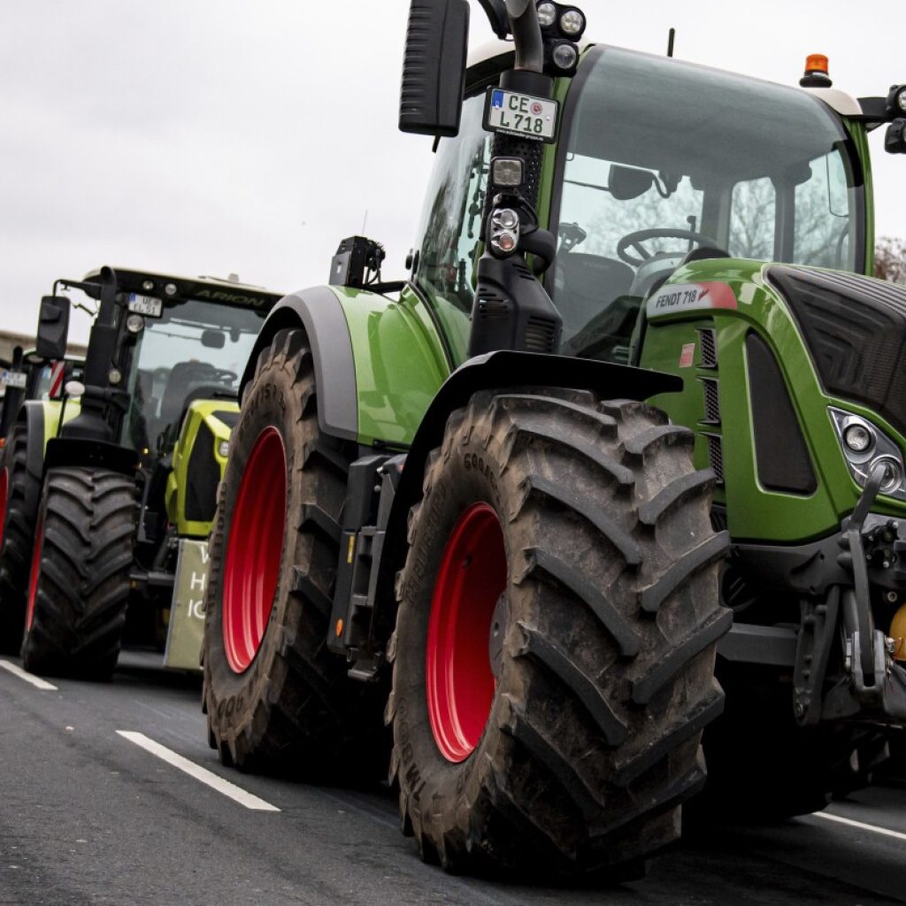 Germany’s government waters down a cost-cutting plan that infuriated the country’s farmers | AP News