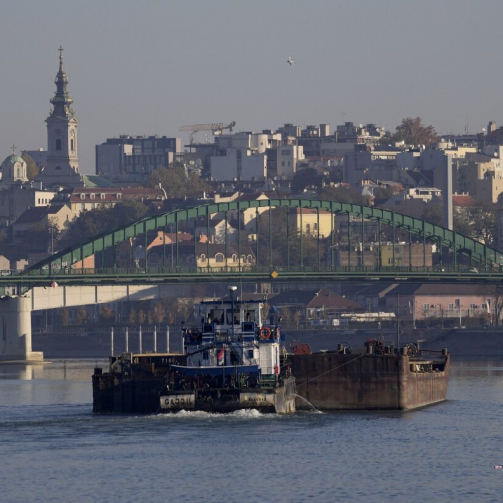 Vessel loaded with fertilizer sinks in the Danube in Serbia, prompting environmental fears | AP News