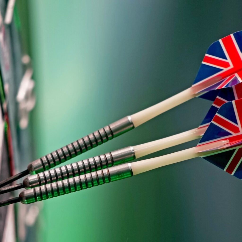 AP PHOTOS: Raucous British fans put on a show at the world darts championship | AP News