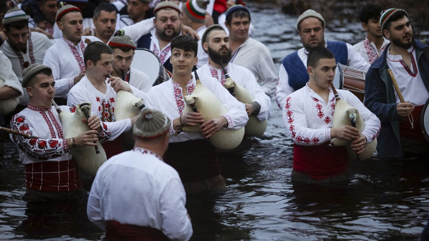 Bulgarians celebrate the feast of Epiphany with traditional rituals | AP News