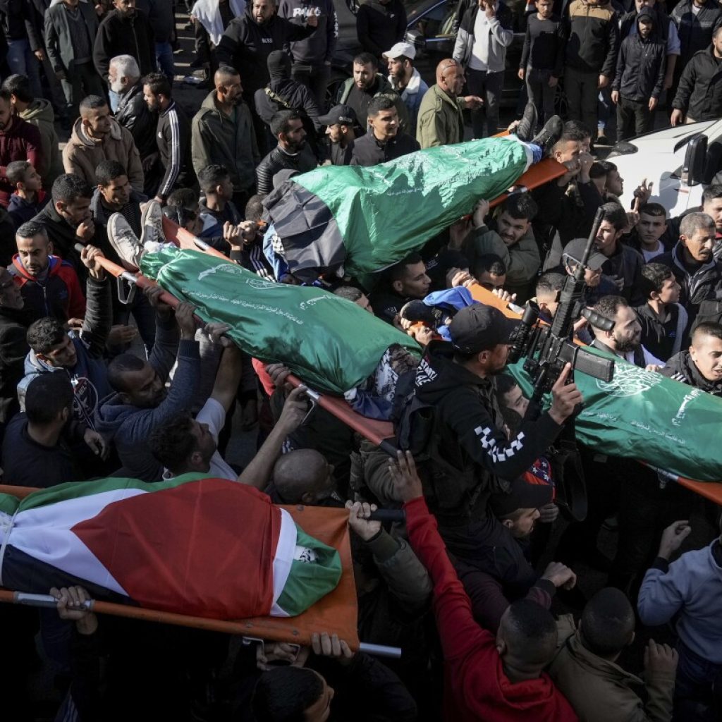 7 Palestinians, an Israeli policewoman and a motorist are killed in West Bank violence | AP News