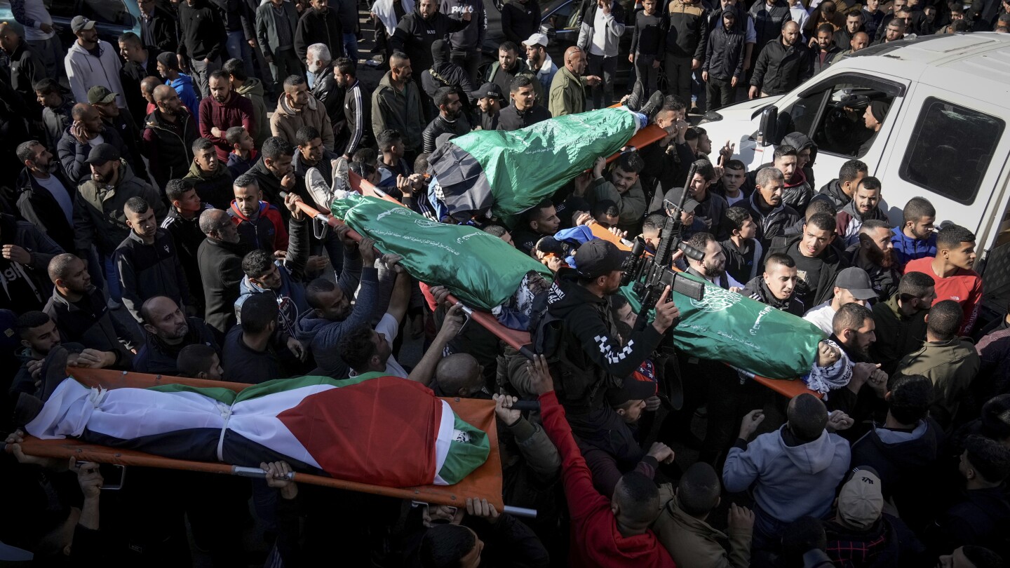 7 Palestinians, an Israeli policewoman and a motorist are killed in West Bank violence | AP News