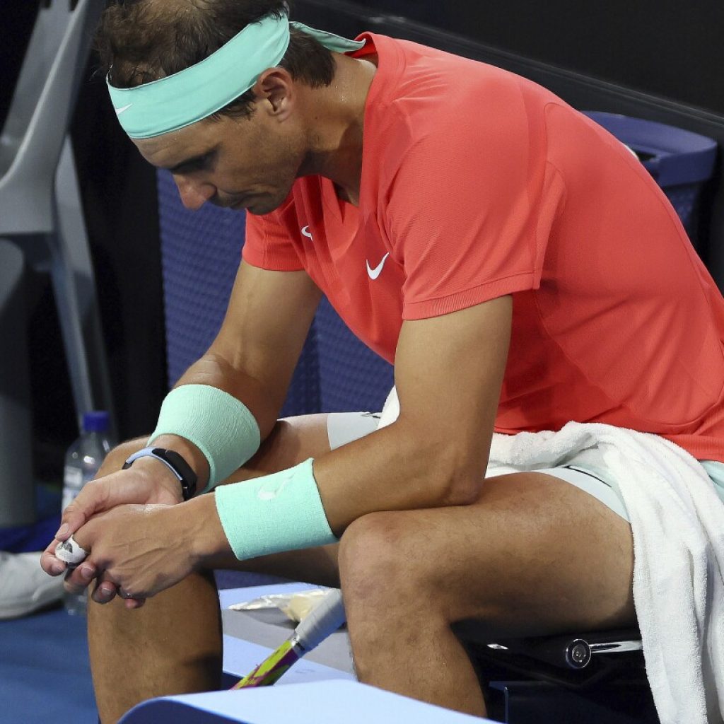 Nadal withdraws from the Australian Open with an injury just one tournament into his comeback | AP News