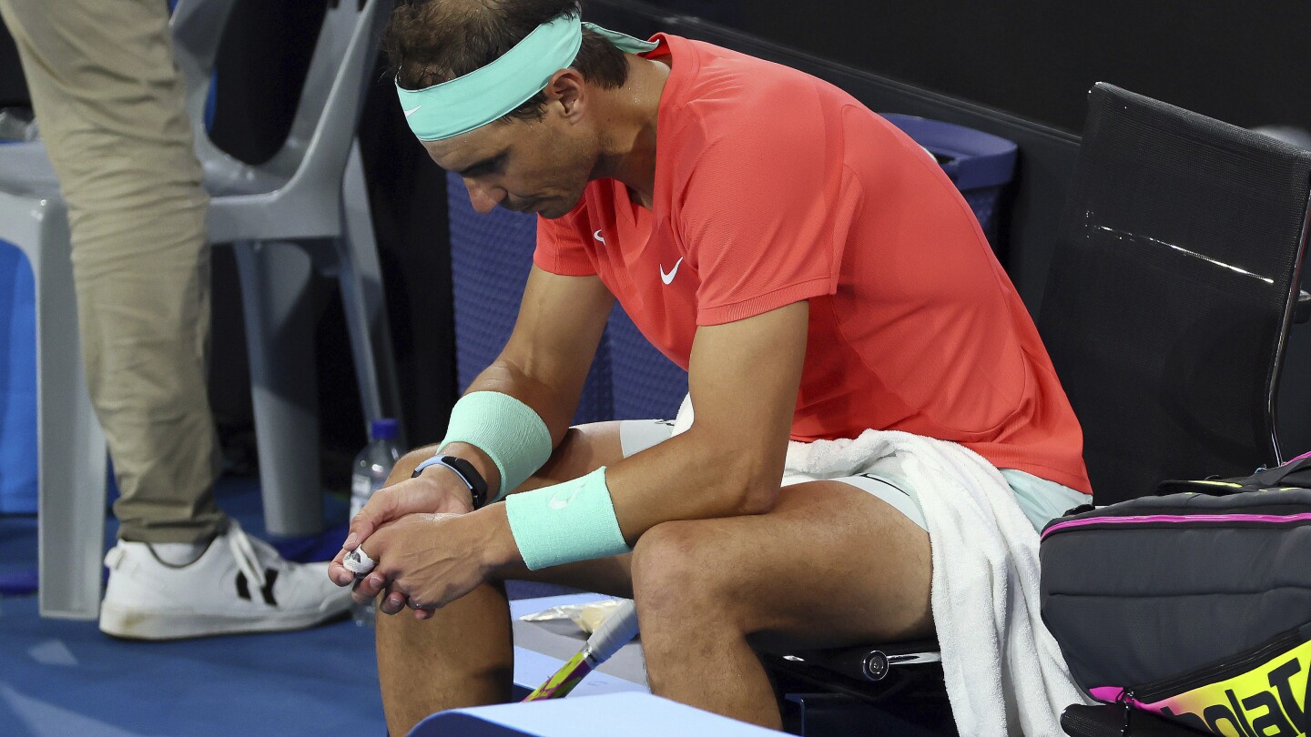 Nadal withdraws from the Australian Open with an injury just one tournament into his comeback | AP News