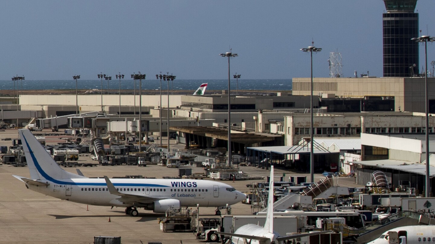 Lebanon airport screens display anti-Hezbollah message after being hacked | AP News