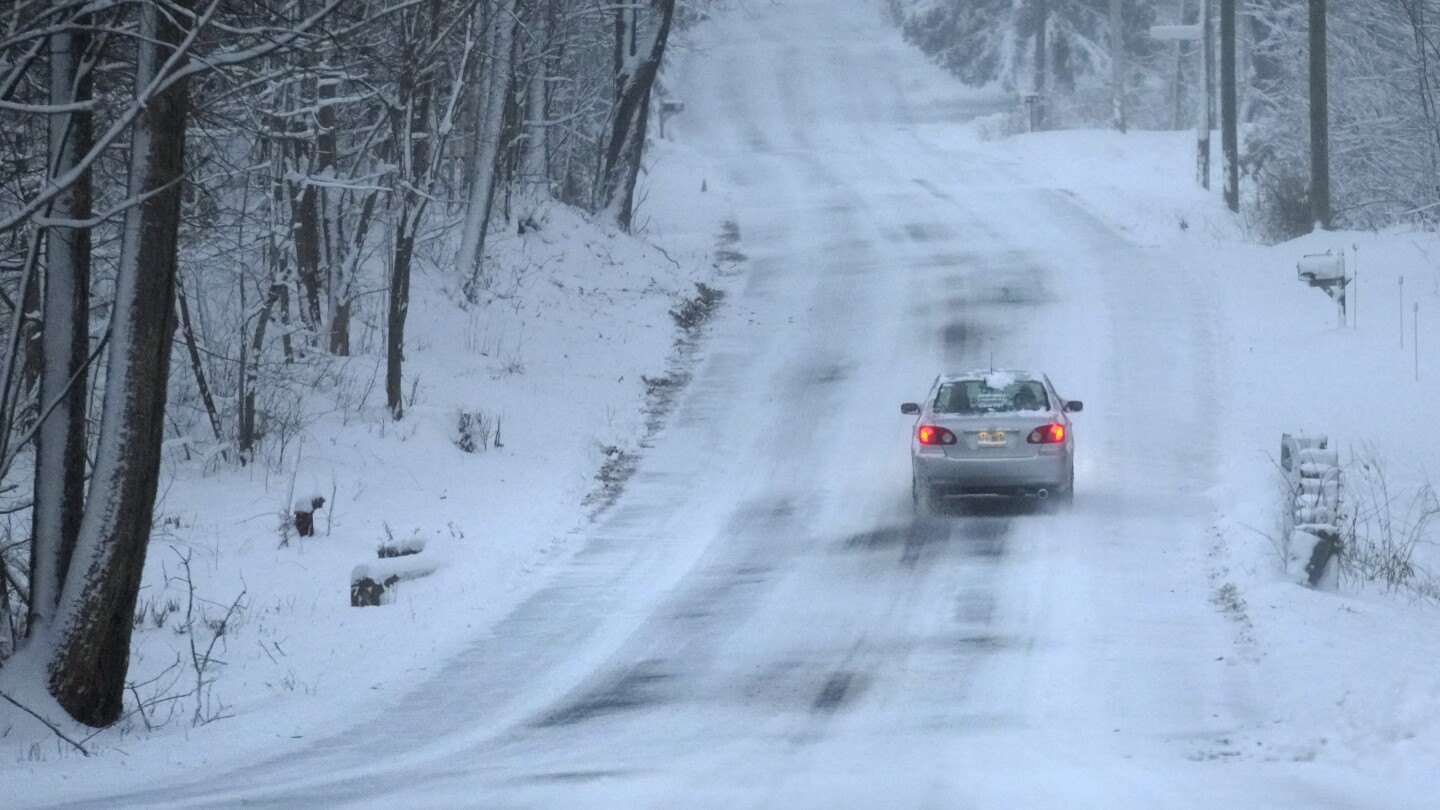 Major winter storms bring snow, ice and travel hazards to both US coasts | AP News