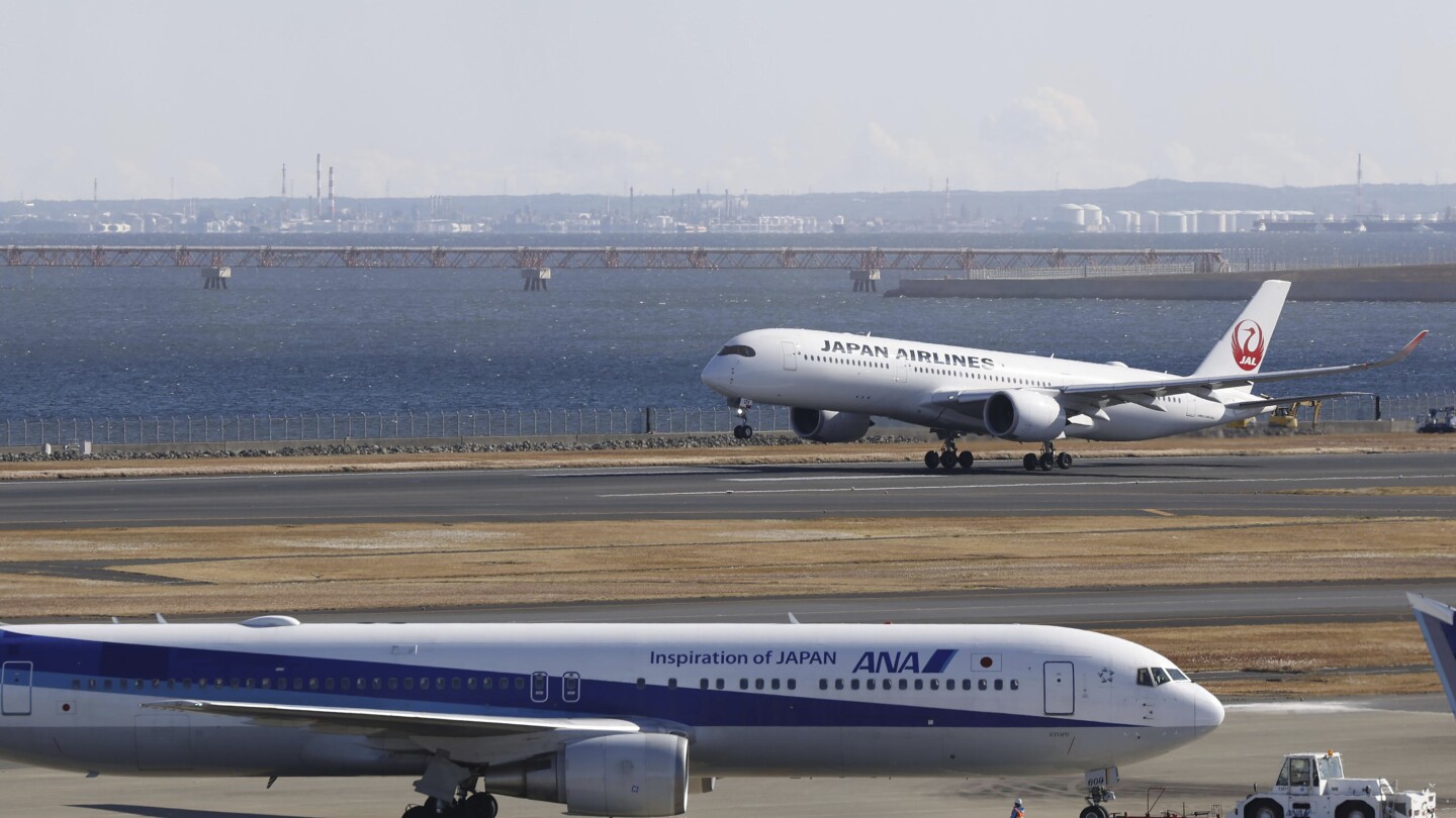 Runway at Tokyo’s Haneda airport reopens a week after fatal collision | AP News