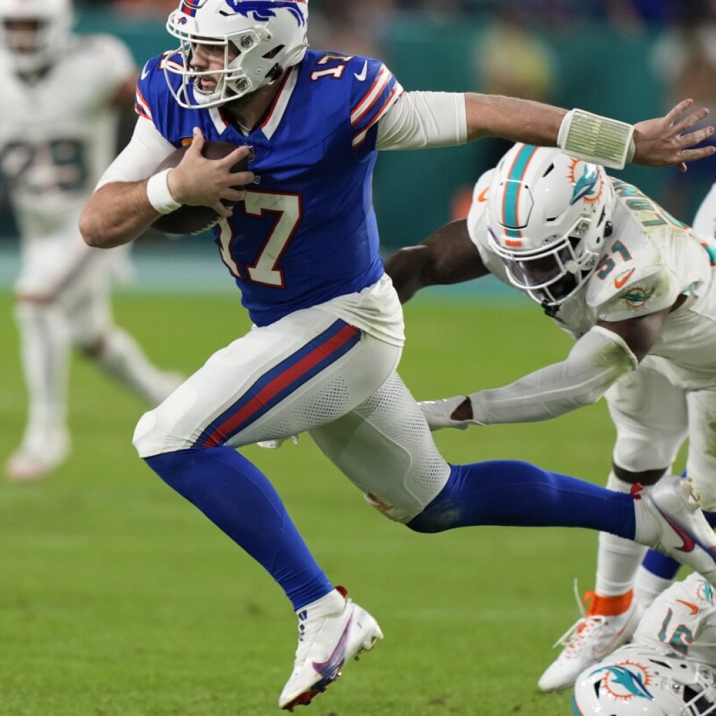 NFL: Josh Allen rallies Bills for 21-14 win over Dolphins | AP News