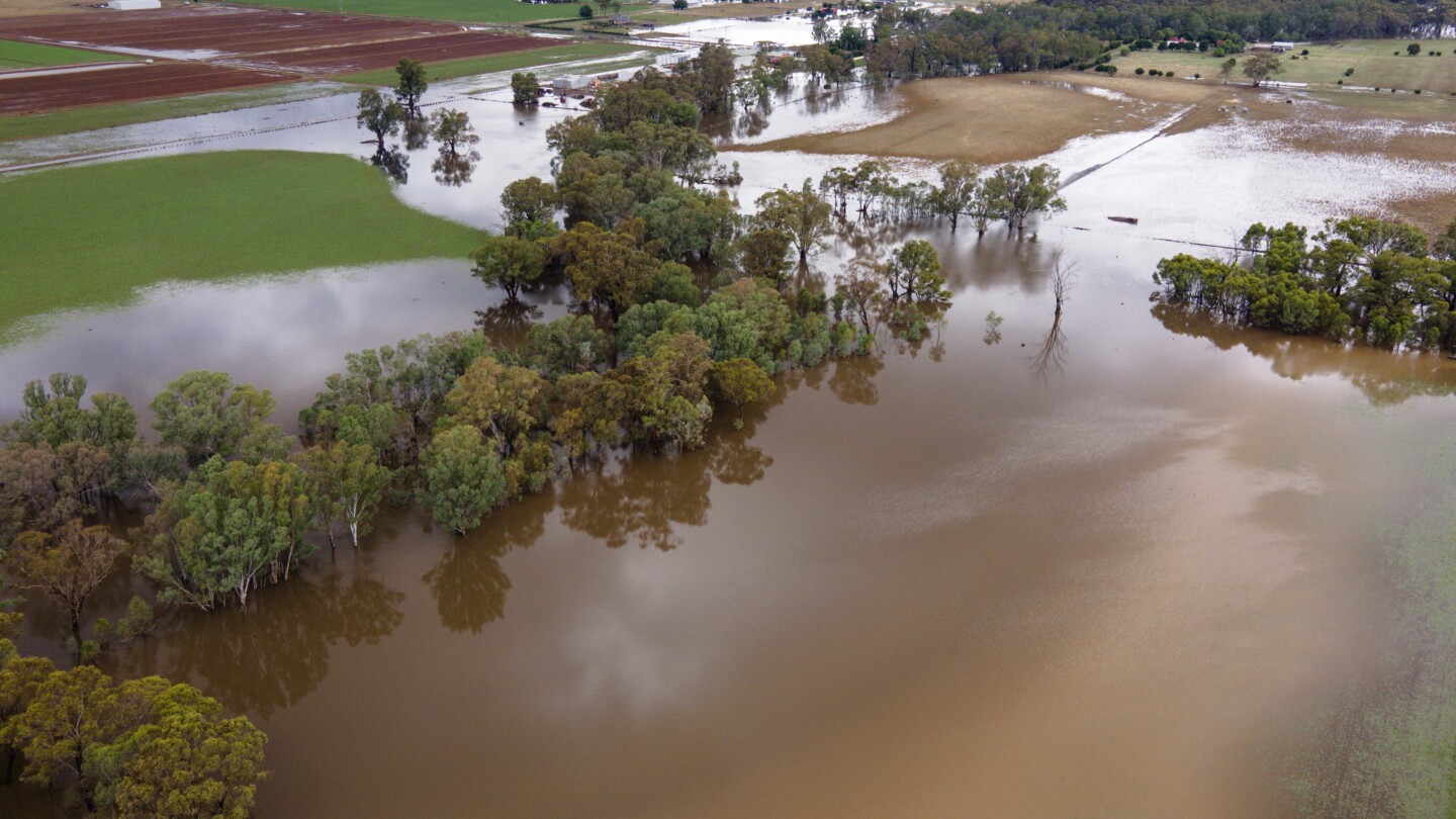 Hundreds evacuate homes, 38 rescued from floods in southeast Australia after heavy storms | AP News