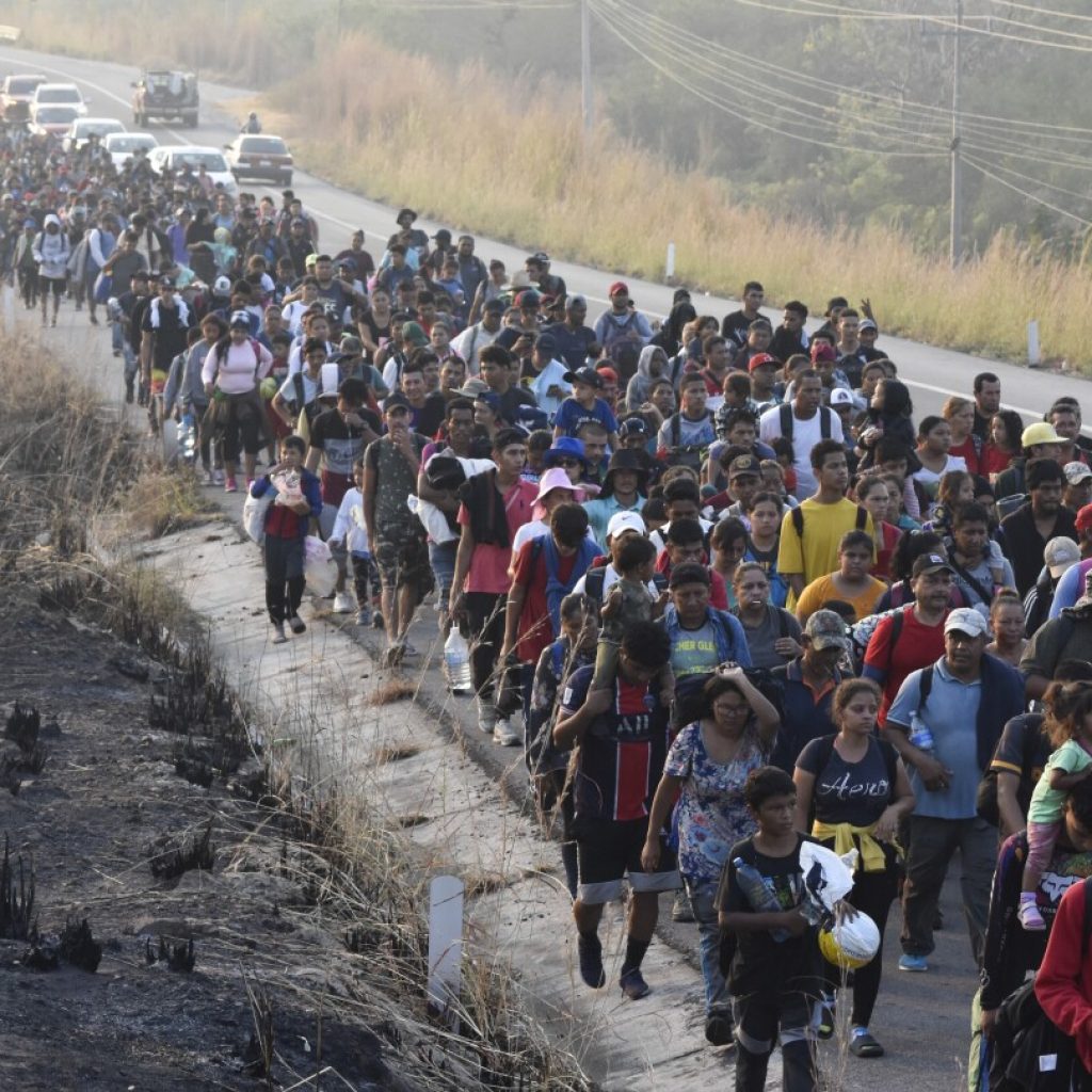 Migrant caravan regroups in Mexico after government promise of papers falls through | AP News