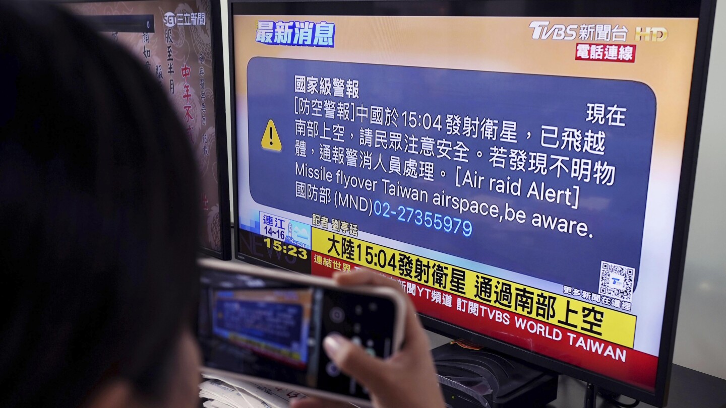 Taiwan issues air raid alert saying China launched a satellite | AP News