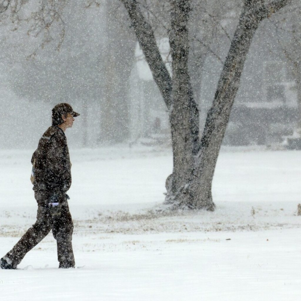 Winter storm: Blizzard conditions wallop central US | AP News