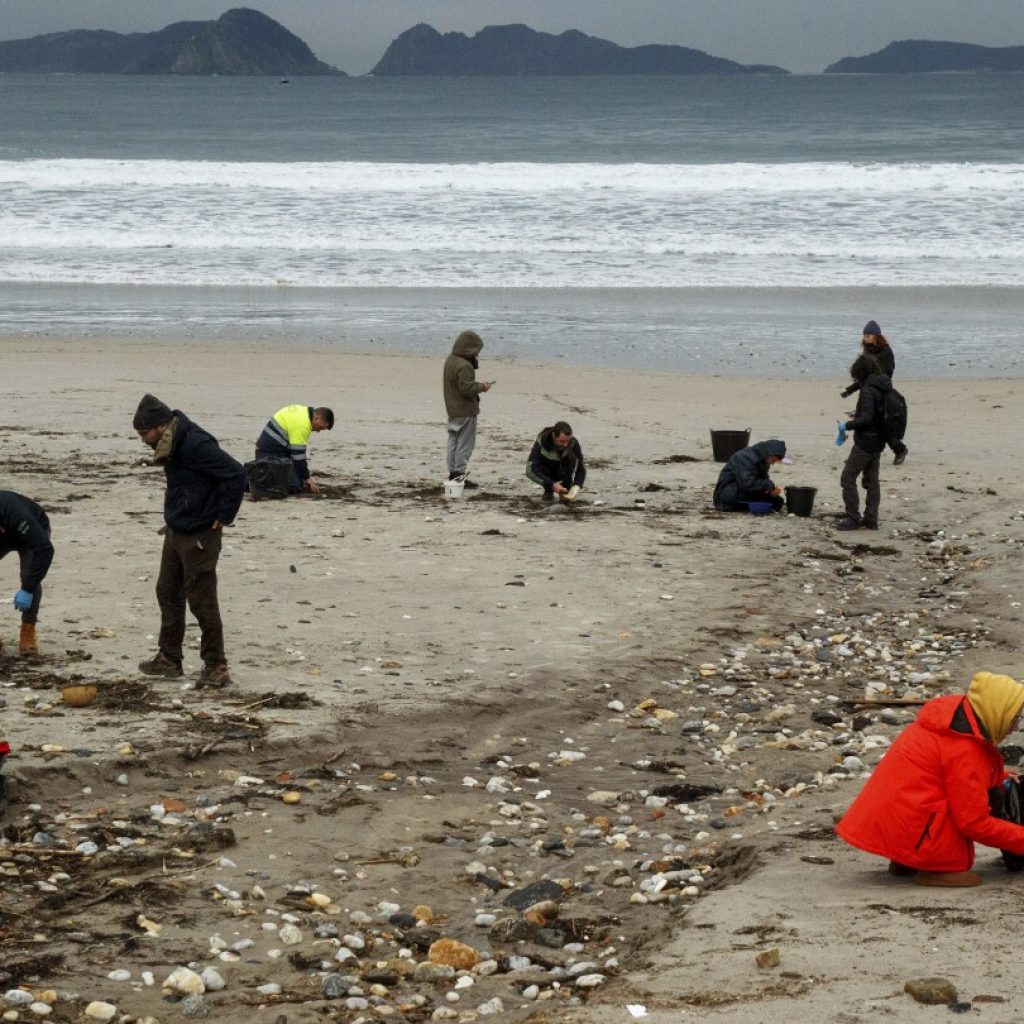 Spain investigates contamination of Atlantic shore by countless plastic pellets spilled from ship | AP News