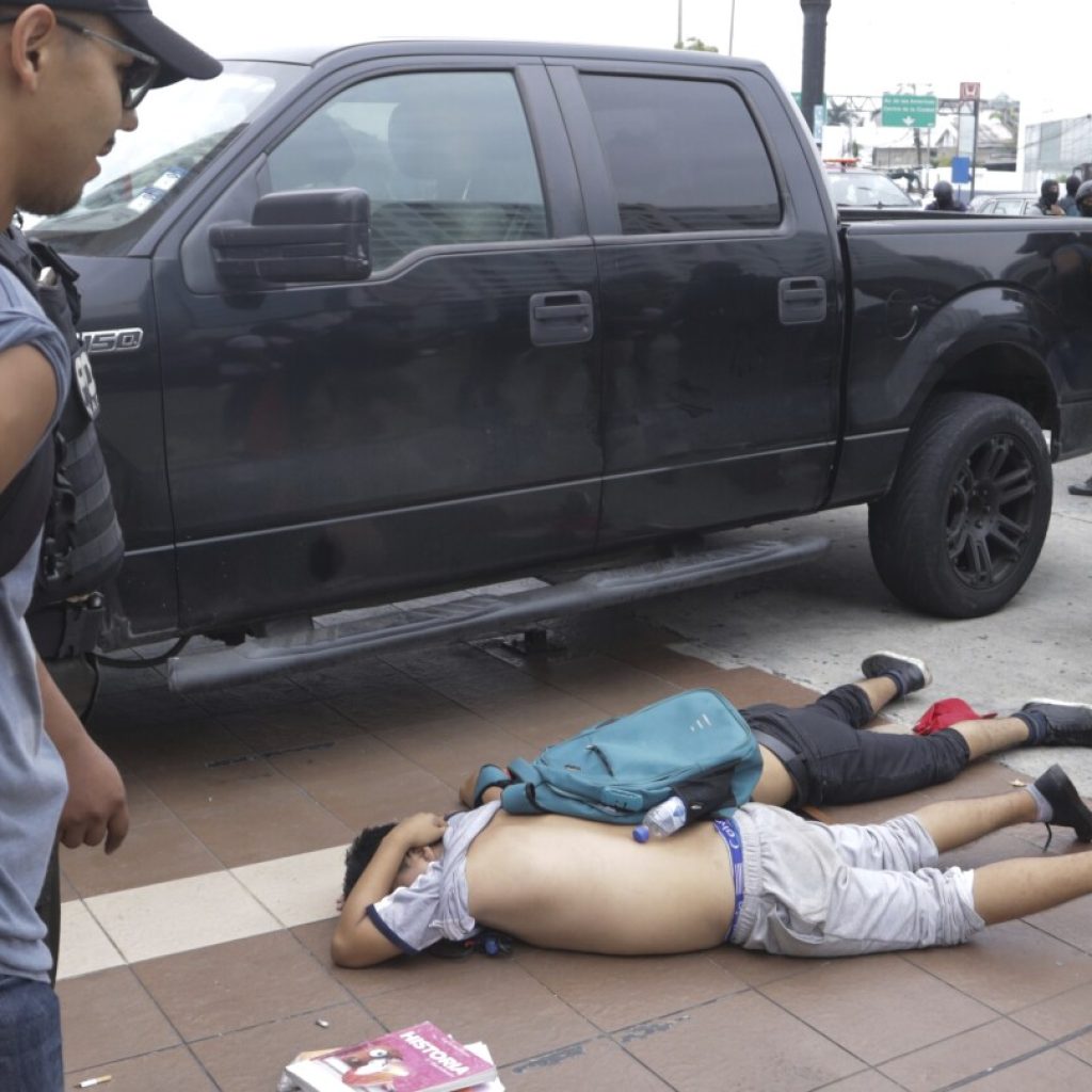 Armed attack during live broadcast at Ecuadorian TV station. What’s behind the spiraling violence? | AP News