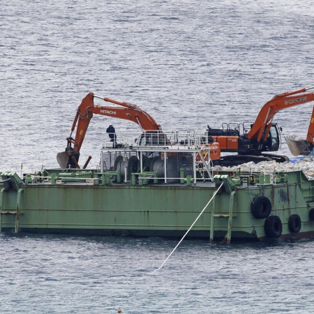 Japan resumes landfill work at new US military site on Okinawa despite local opposition | AP News