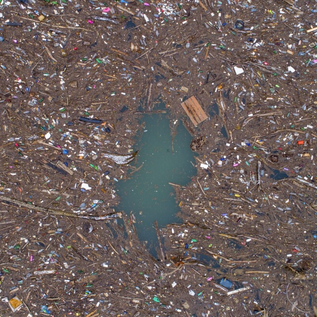 Tons of trash clogs a river in Bosnia. It’s a seasonal problem that activists want an end to | AP News