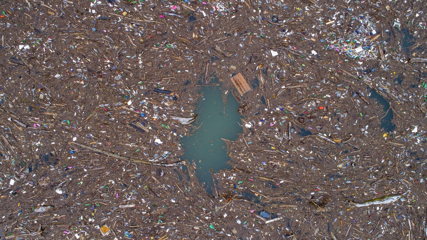 Tons of trash clogs a river in Bosnia. It’s a seasonal problem that activists want an end to | AP News