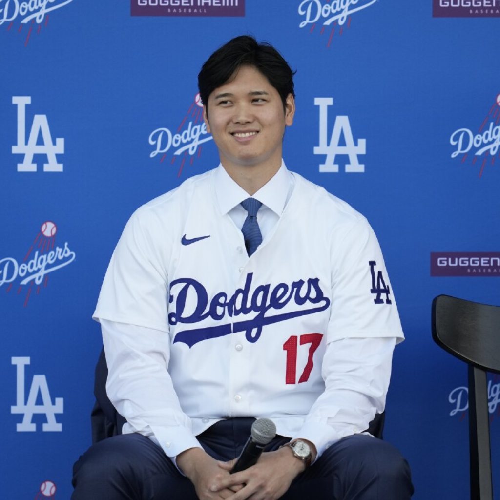 Shohei Ohtani visits US Embassy in Japan and his dog gets mock visa | AP News