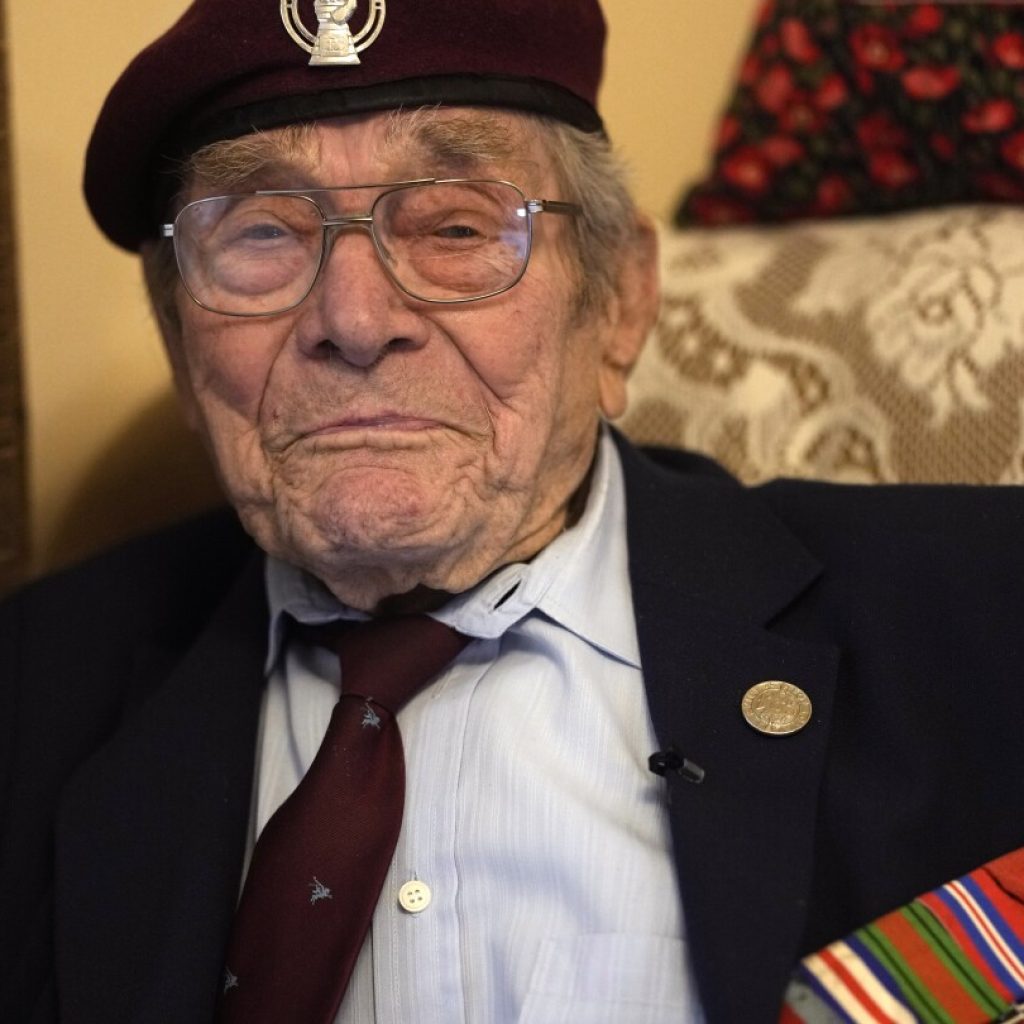 A British D-Day veteran celebrates turning 100, but the big event is yet to come | AP News