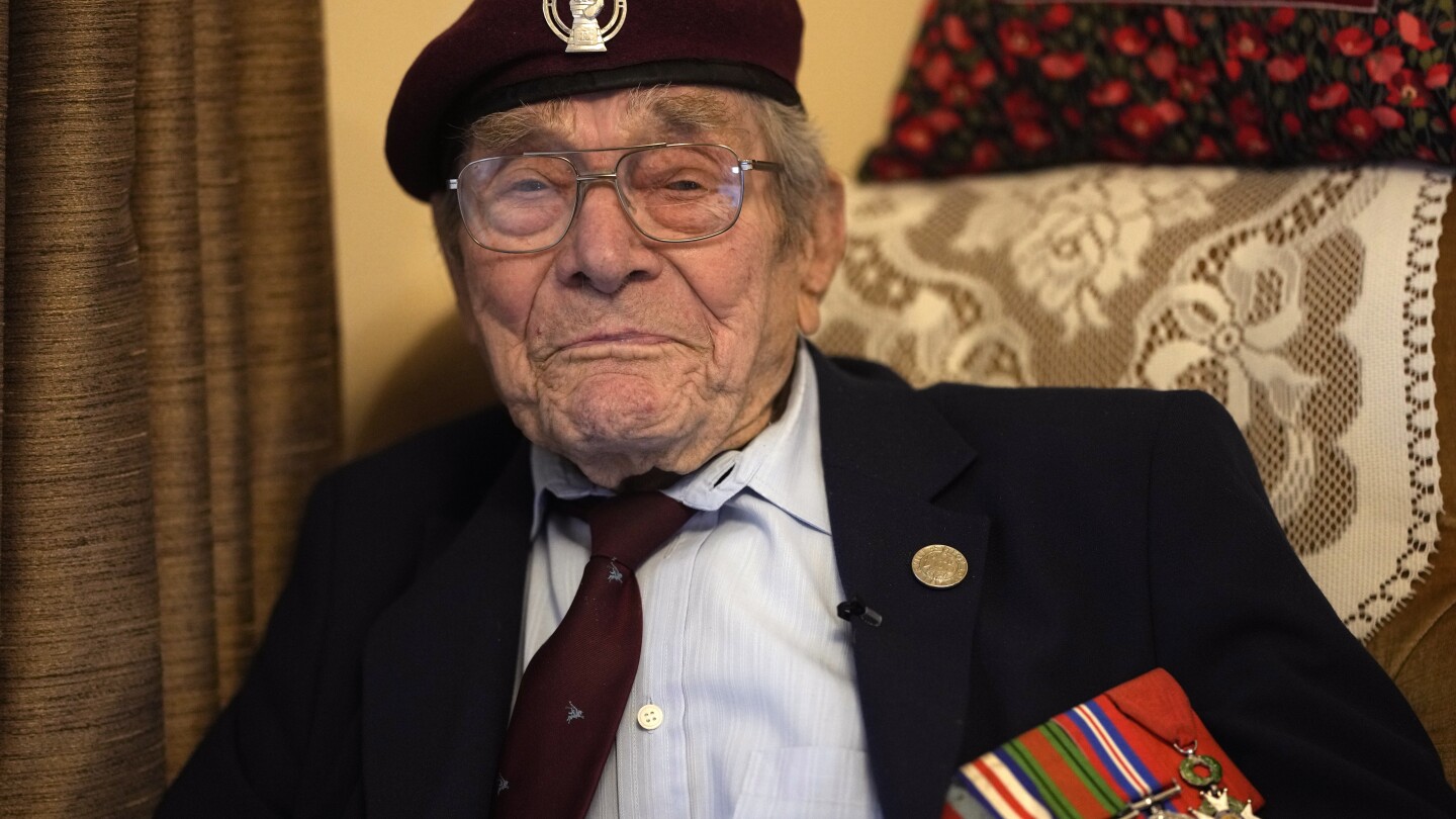 A British D-Day veteran celebrates turning 100, but the big event is yet to come | AP News