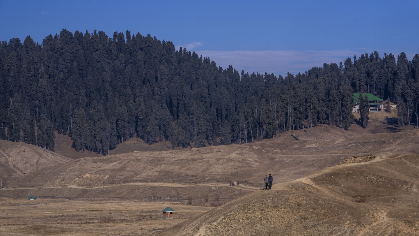 Kashmir residents suffer through a dry winter waiting for snow. Experts point to climate change | AP News