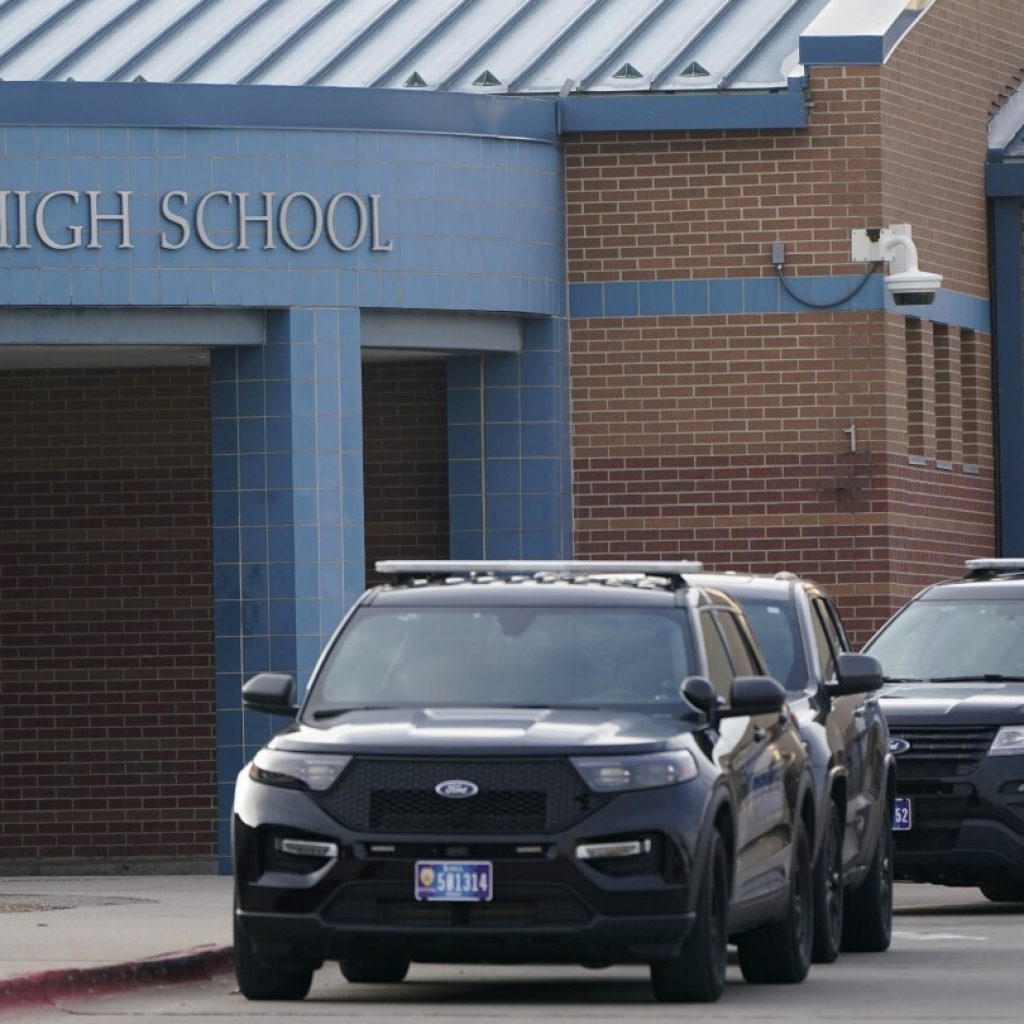 Iowa school shooting: Principal who risked life to protect Perry students has died | AP News